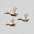 Shimmering Ducks in Gold